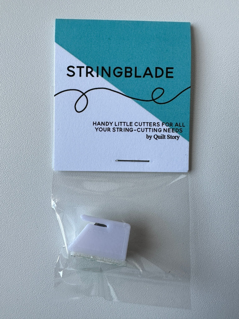 Stringblade Quiltstory Quilt Story Deutschland kaufen bestellen Fadenschneider selbstklebend Quiltshop Der Rabe im Schlamm